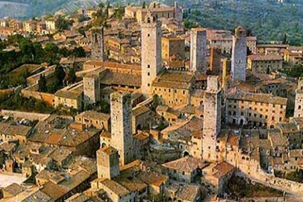 a castle like building with a mountain in the background