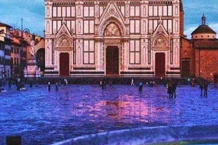 a large body of water in front of a church