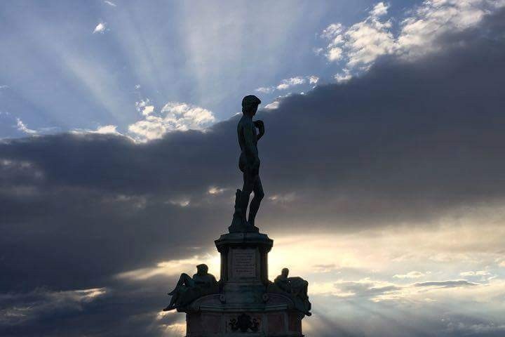 a clock tower on a cloudy day