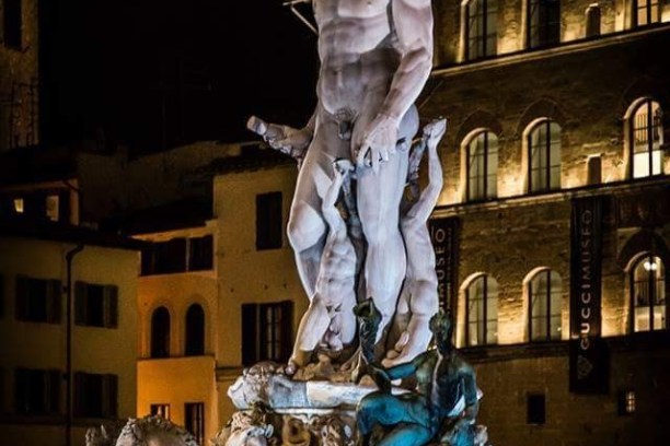 a person standing in front of a crowd